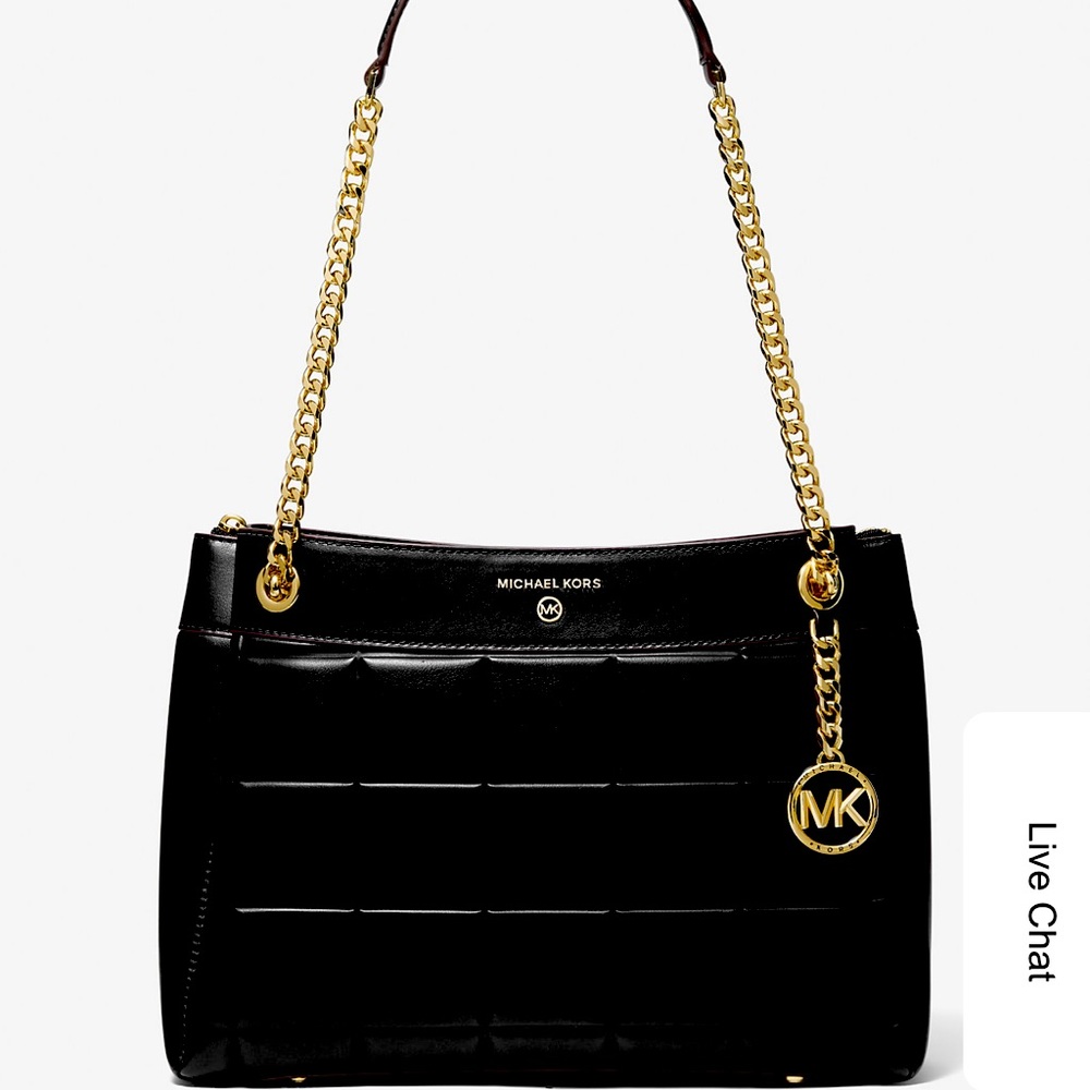 • Quilted 
• 100% leather 
• Gold-tone hardware
• 14"W X 9.5"H X 5.5"D